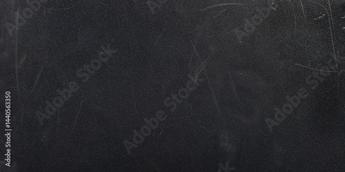 Scratched plastic surface with rough texture, seen up close	
