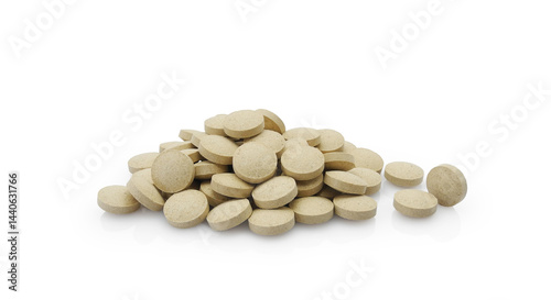 Heap of vitamin tablets or food supplements isolated on white background
