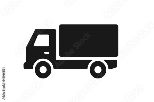 Delivery truck transporting goods on an urban street during daytime
