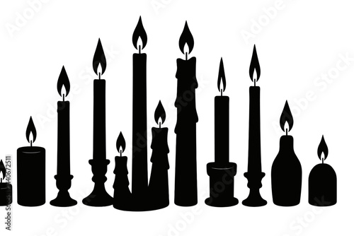 Collection of various candle silhouettes arranged in different heights with flickering flames showcasing a serene atmosphere