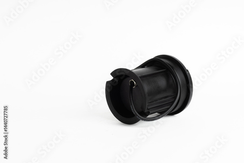Black Round Inground Outdoor LED Light with Side Openings and Exposed Wires Isolated on White Background

