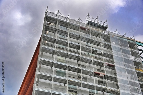 perspective view from below of huge scaffolding at building restoration site
