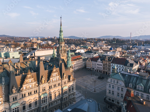 Skyline cityscape of Liberec, Czech Republic. Panoramic aerial view of the old town (staré město): main square and city hall at sunset