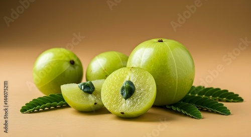 amla fruit on a green background