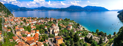 Obraz na płótnie Italy, Piedmot region (Piemonte) beautiful Lake Lago Maggiore. scenic village Cassino in Cannero Riviera , border with Switzerland. Aerial panoramic view of lakeside town and mountains w salonie
