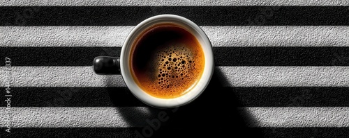 Obraz na płótnie Hot cup of coffee on striped background with high contrast lighting w salonie