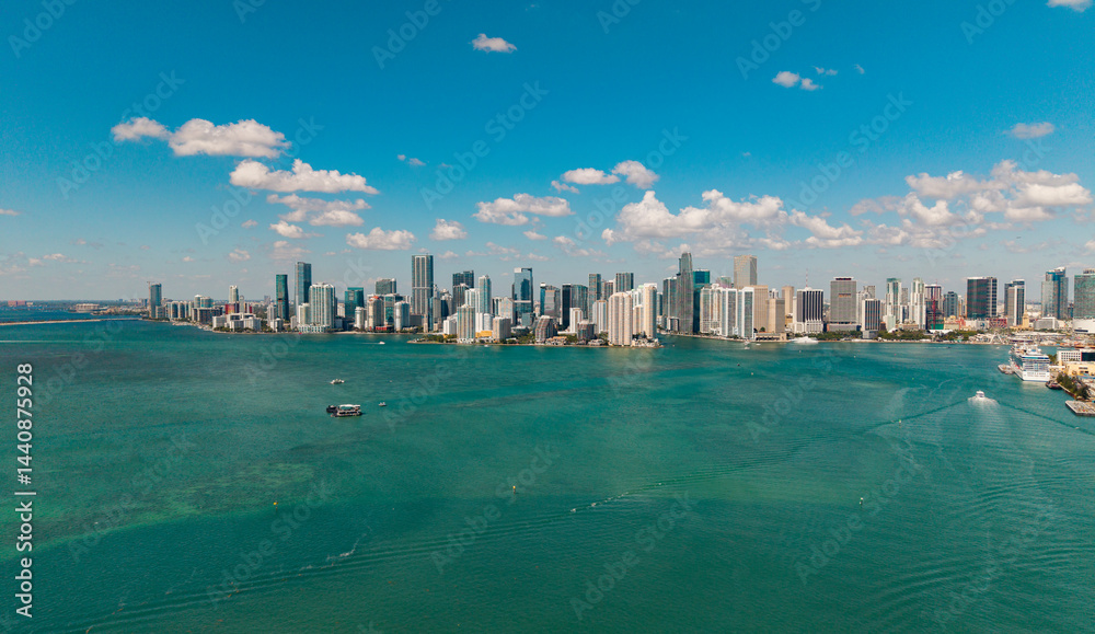 Obraz premium City skyline. Miami from Brickell Key in Florida. Skyscraper in downtown city. Cityscape skyline. Brickell building in Miami downtown. Brickell skyline with skyscraper architecture. Luxury life