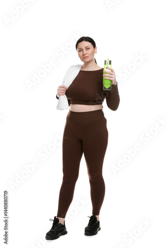 Plus size woman in gym clothes with towel and water bottle on white background
