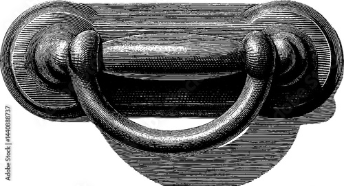 Vintage ornate metal drawer handle with detailed etching design.