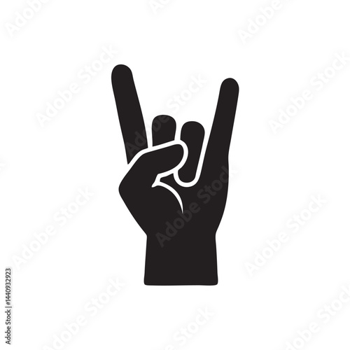 silhouette of fingers pointing up symbol of metal rock
