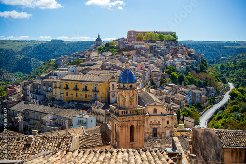 Fototapeta Naklejka Na Ścianę i Meble -  View of the historic center of Ragusa, Sicily, Italy, with the tower of the blue-domed Santa Maria dell'Itria church, a UNESCO World Heritage Site.