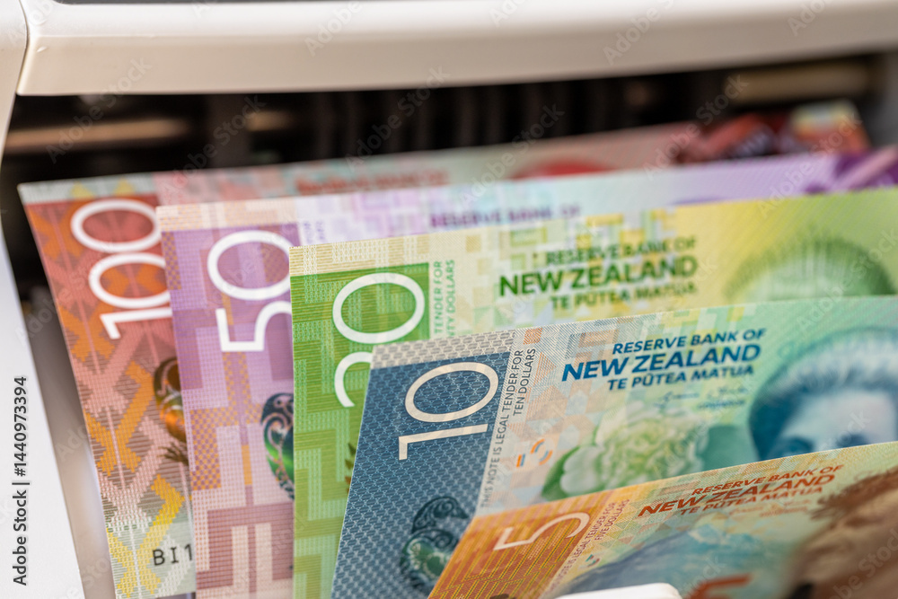 New Zealand dollar in a money counter. Financial and business concept. All banknotes. Banking, economics, investing in New Zealand. close up