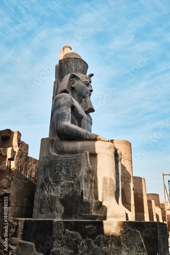 Luxor, Egypt - December 26 2023: Statue of Ramesses II at Luxor Temple