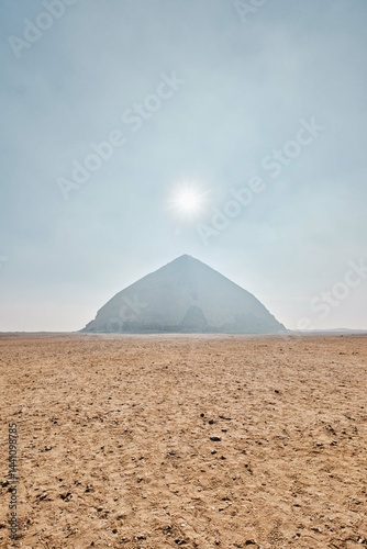 Saqqara, Egypt - January 2, 2024: The ancient Bent Pyramid of Dahshur for Pharaoh Snefru, near Cairo