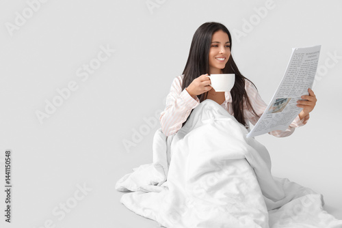 Beautiful woman with blanke...