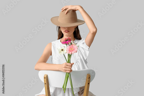 Beautiful young woman with ...