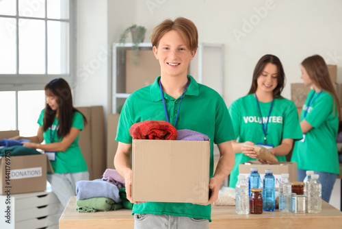 Young male volunteer with d...