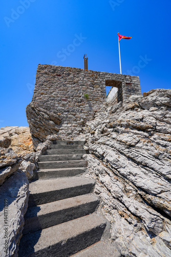 Obraz na płótnie Kastio Castle built on a peninsula in Petrovac na Moru, a resort town located on the coast of the Adriatic Sea in Montenegro w salonie