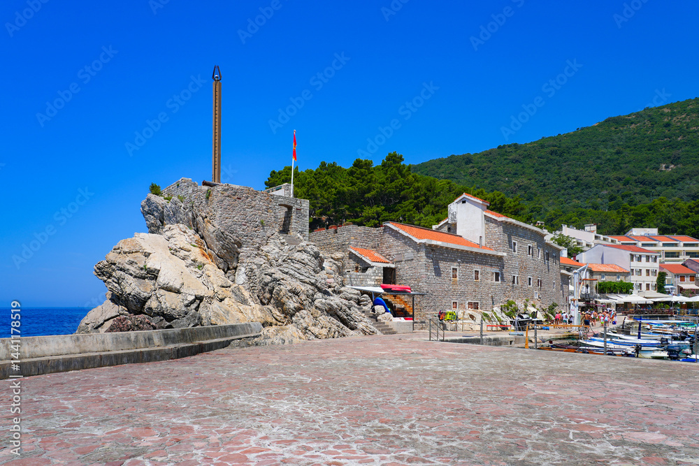Kastio Castle built on a peninsula in Petrovac na Moru, a resort town located on the coast of the Adriatic Sea in Montenegro