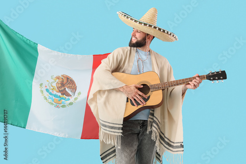 Handsome man in sombrero ha...