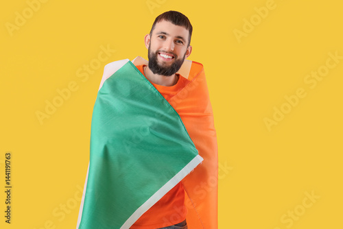 Handsome man with flag of I...