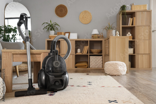Black canister vacuum clean...