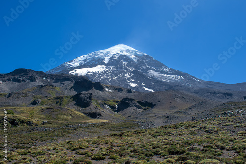 peak of cone-shaped volcano Lanin with its glacier, patagonia, argentina
