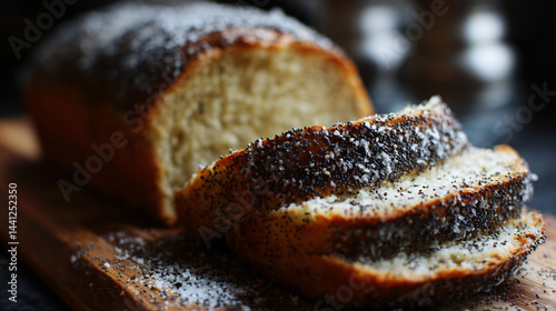 Obraz na płótnie Freshly baked poppy seed loaf, soft and flavorful. w salonie