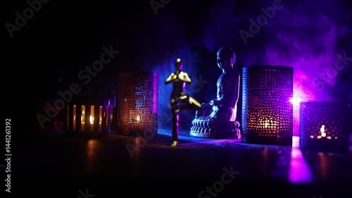 Yoga Concept with Namaste Statue and Oriental-Inspired Miniature on Table. Miniature in selective focus