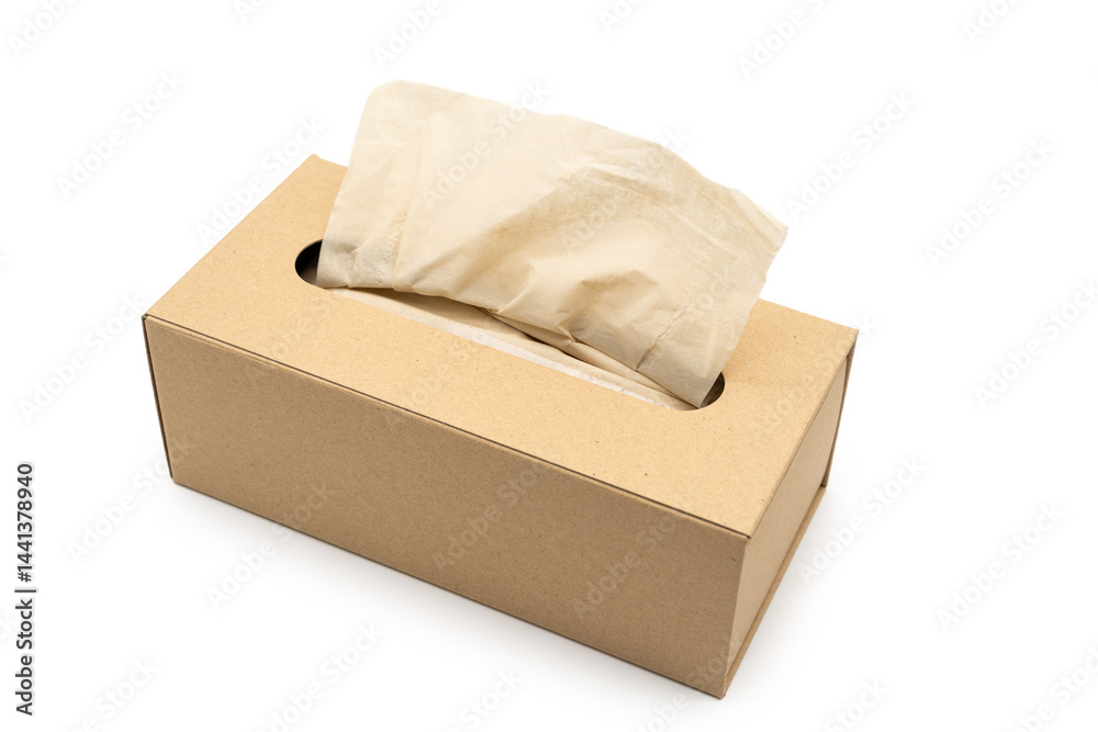Brown tissue paper box isolated on white background with Clipping path. Copy space for text. Nice natural cardboard box of paper tissue.