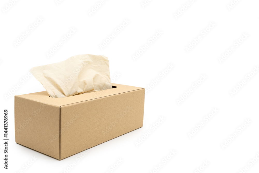 Brown tissue paper box isolated on white background with Clipping path. Copy space for text. Nice natural cardboard box of paper tissue.