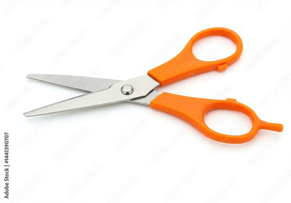 An open pair of scissors with orange handles lying on a white surface in a studio setting An open pair of scissors with orange handles lying on a white surface in a studio setting