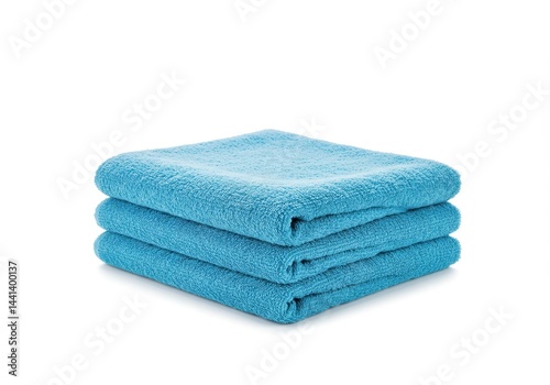 A stack of three folded light blue terry cloth towels on a plain white background with soft shadows