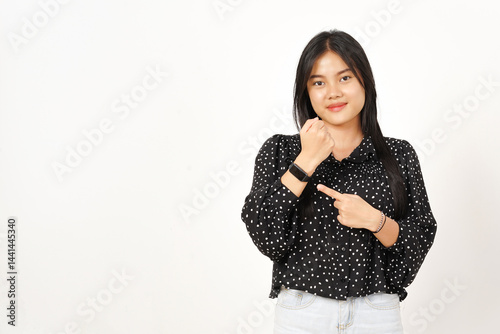 Photos Pointing to watch and Smile Of Beautiful Asian Woman Wearing black Isolated On W