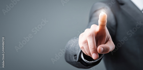 Business people touch a certain place with their fingers
