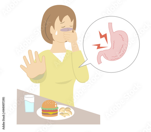 胃がムカムカして口を手で抑え食事を食べることができない若い女性