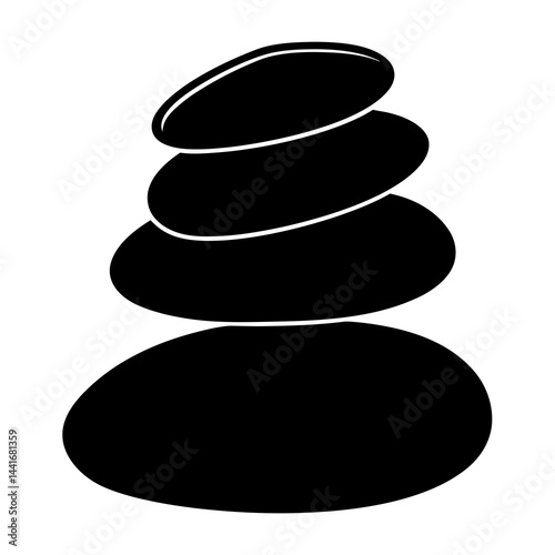 Smooth black pebbles stacked in zen stone silhouette