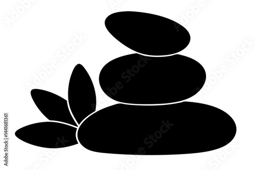 Smooth black pebbles stacked in zen stone silhouette