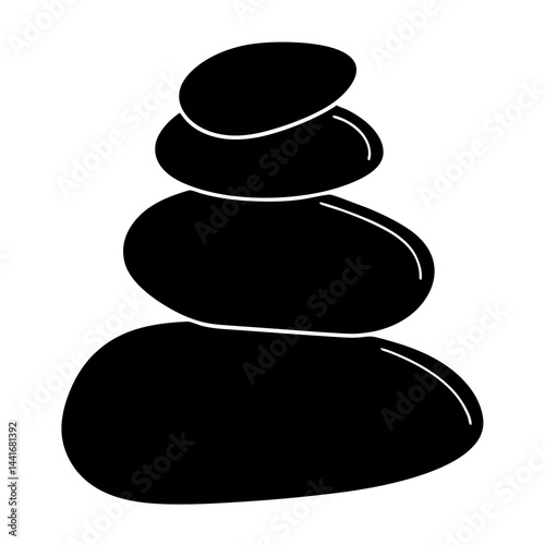 Smooth black pebbles stacked in zen stone silhouette