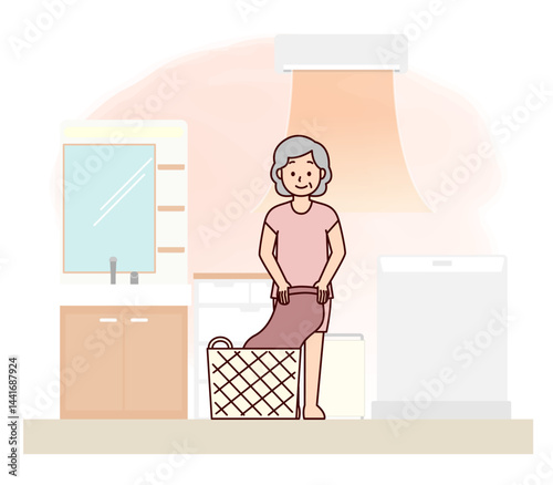 暖かい脱衣所で服を脱ぐ高齢女性