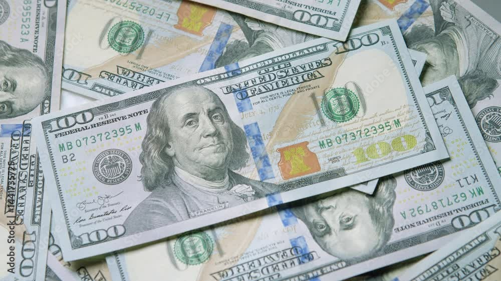 Stacks of cash consisting of US Hundred Dollar Bills, representing financial wealth and assets Stacks of cash consisting of US Hundred Dollar Bills, representing financial wealth and assets