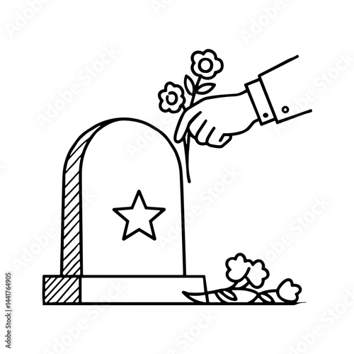 Hand placing flowers at a gravestone for Memorial Day USA  