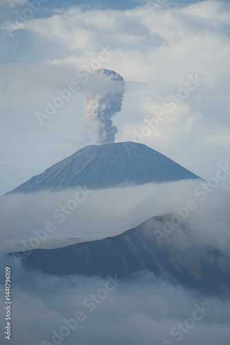 Volcanic eruption event mountain location natural phenomenon content cloudy environment aerial viewpoint earth science concept for seo impact