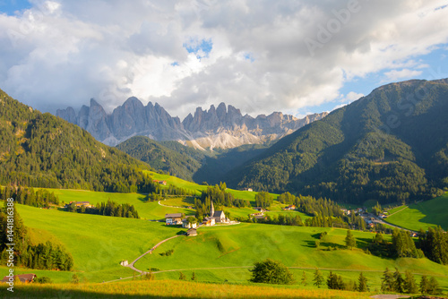 The Dolomites are a mountain range in northeastern Italy. They are part of the Alps, bordered by the Adige River to the east and the Puster Valley to the south. photo