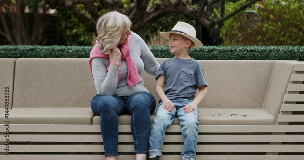 Smile, happy and grandmother with child on park bench for bonding, affectionate and relax. Love, happiness and conversation with old woman and grandson in nature for family, care and retirement Smile, happy and grandmother with child on park bench for bonding, affectionate and relax. Love, happiness and conversation with old woman and grandson in nature for family, care and retirement