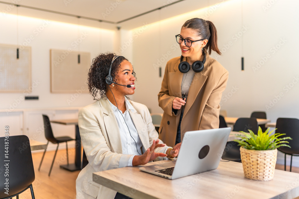 Customer service operators working together in modern office