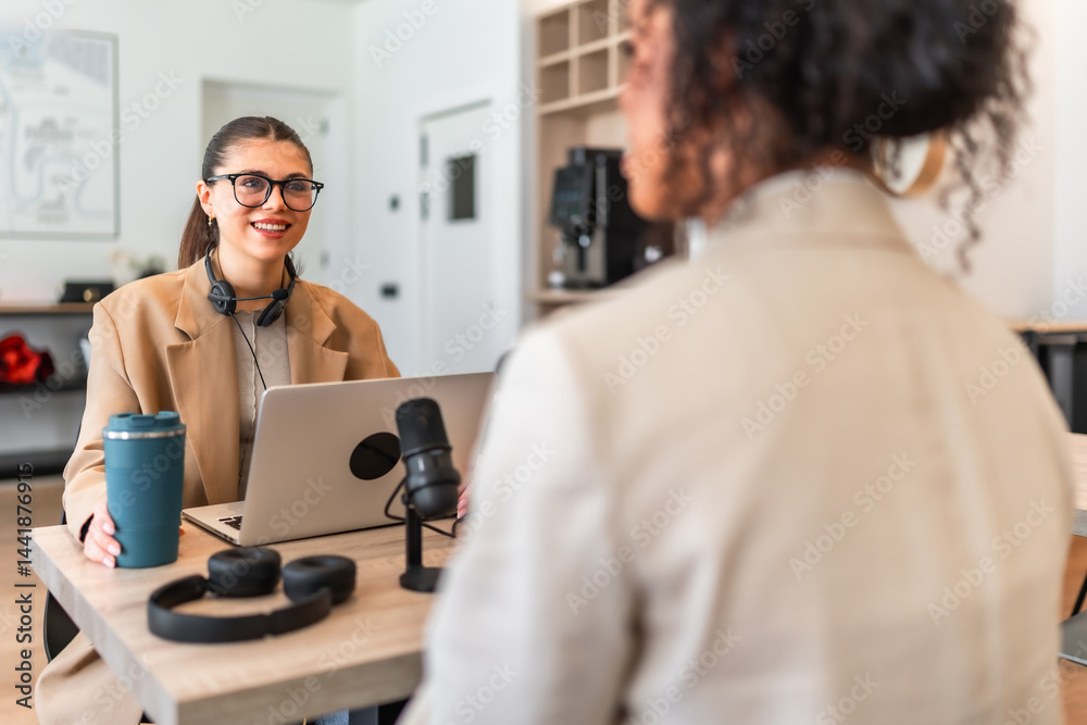 Podcasters recording a new episode in modern office