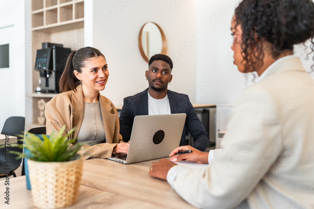 Businesspeople having meeting with consultant in office