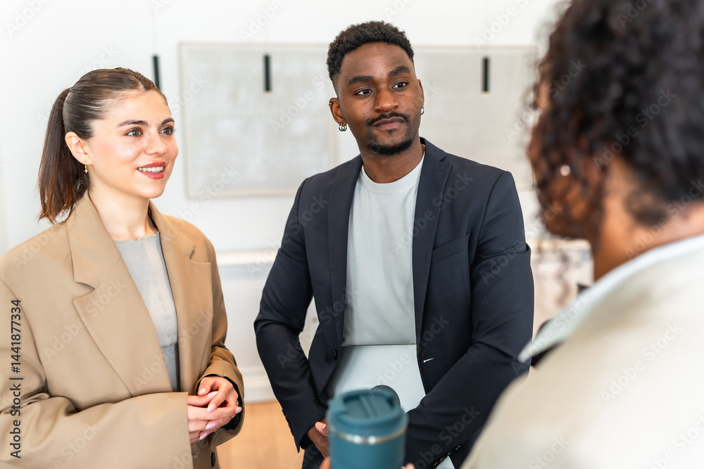 Business people having a conversation in modern office