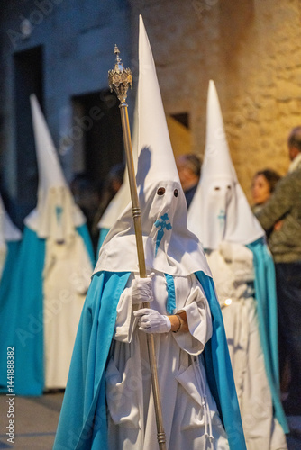 Hooded brothers with conical hats that serve as masks, Holy Week procession, Llucmajor, Mallorca, Balearic Islands, Spain